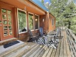 It`s all about the sunny front deck vibes at this custom mountain cabin